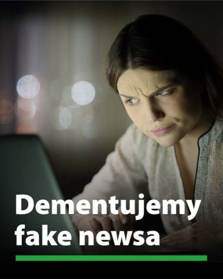 Kobieta siedząca przy laptopie oraz napis Dementujemy fake newsa