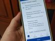 Zdjęcie - Smartfon w dłoni na którego wyświetlaczu widać napisy Wybierz temat e-wizyty